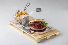 Wild boar burger in a potato bun with red cabbage served with steak chips